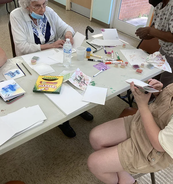 Young painters at work during the PACA summer art program