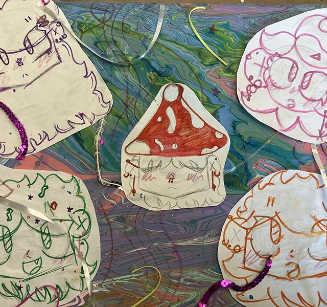 Students painting at a PACA youth art class